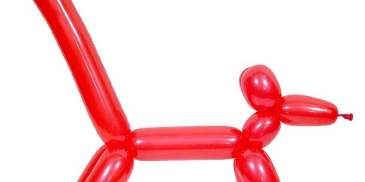 A vibrant balloon with a puppy teething toy, showcasing its importance for soothing gums.